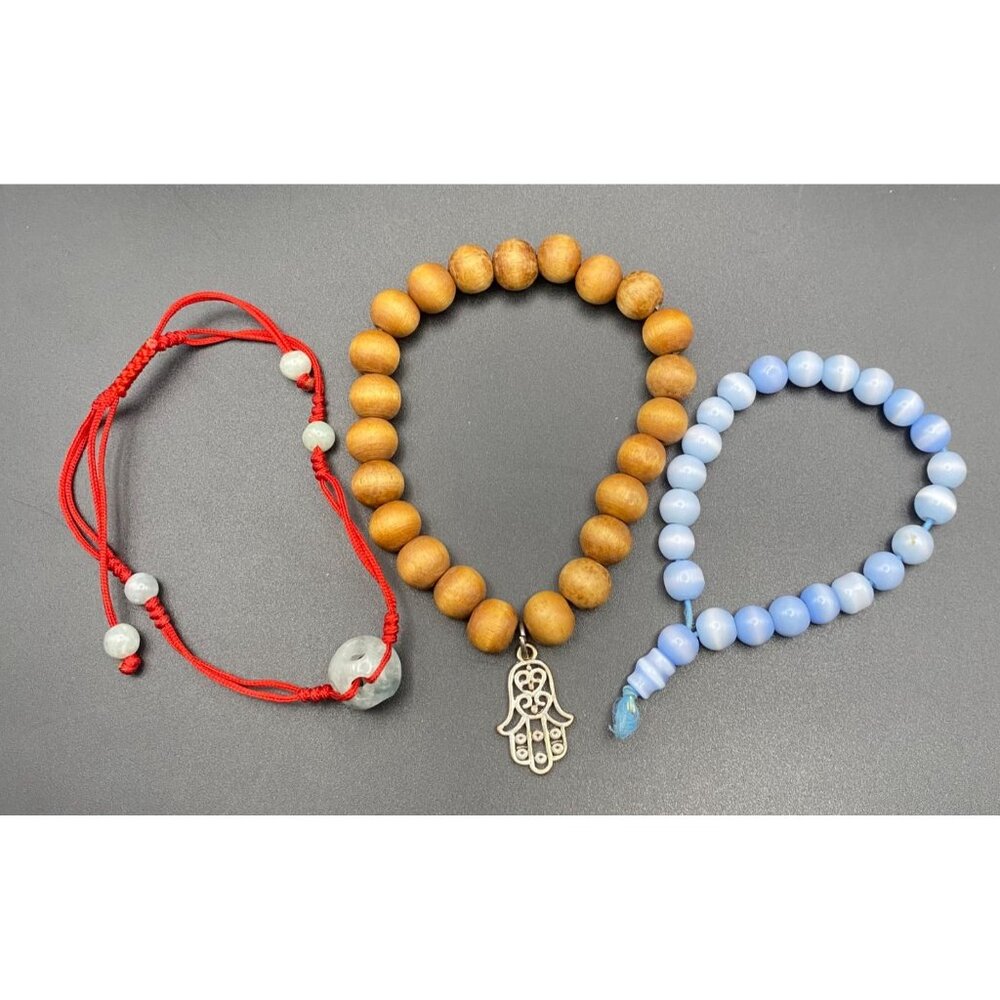 Lot of 3 Spiritual Beaded Bracelets Blue Jadeite Cats Eye Glass Wood Hamsa